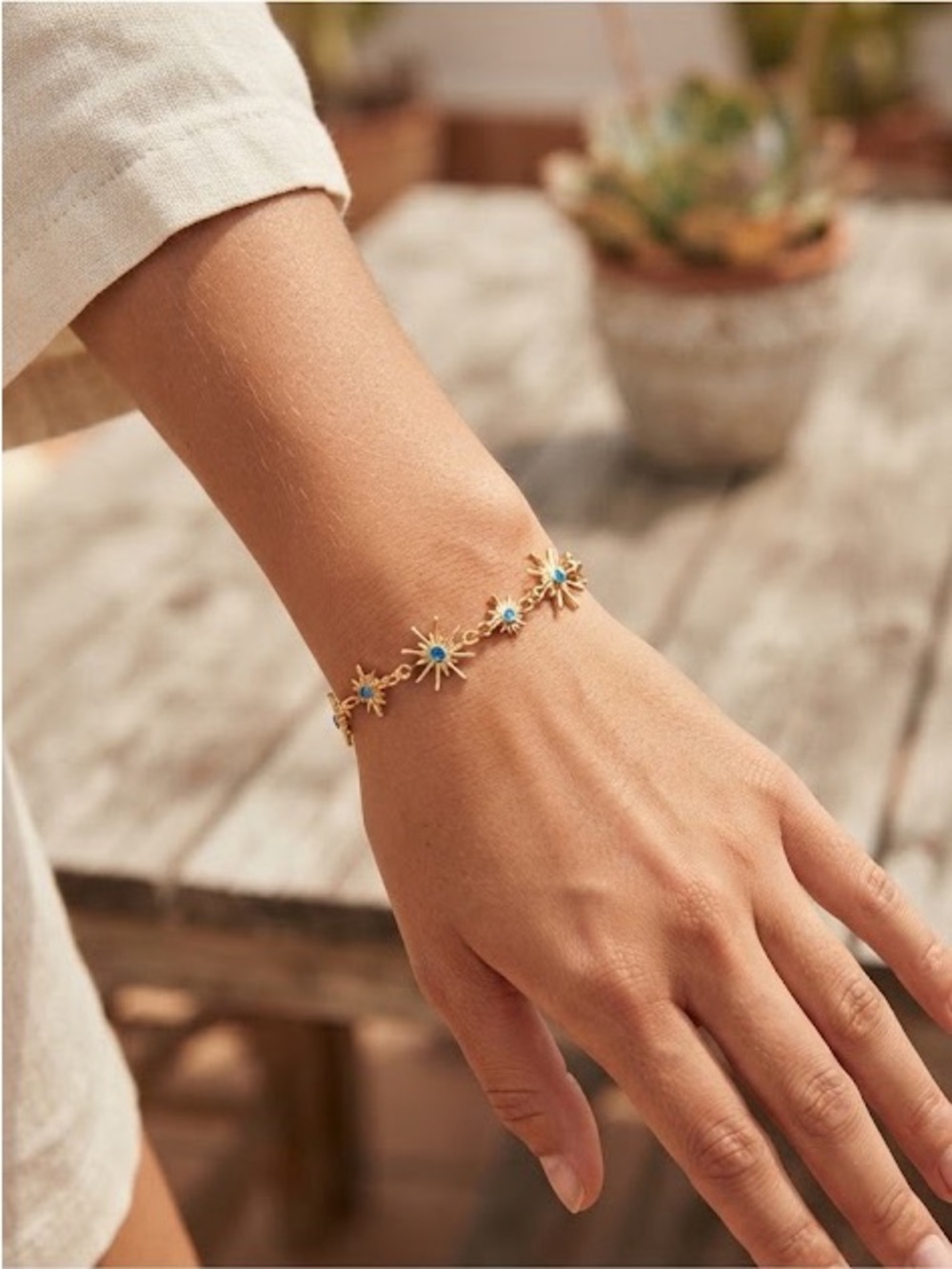 Gold Starburst Bracelet with Turquoise Accents
